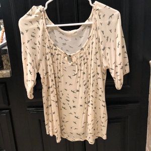 Green birds on cream background top